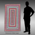 Mackenzie Childs braided rug